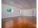 Spacious bedroom features hardwood floors, decorative ceiling and bright windows at 317 Belwood Dr, Belmont, NC 28012