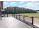 Expansive deck overlooking lush greenery and a gazebo, perfect for outdoor enjoyment at 4556 Harley Davidson Dr, Catawba, NC 28609