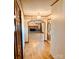 Foyer view showcasing hardwood floors, decorative doors, and arched entryway to the living room at 4556 Harley Davidson Dr, Catawba, NC 28609