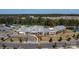 Aerial view of community clubhouse, pool, and tennis courts at 7014 Jolly Brook Dr, Charlotte, NC 28215