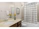 Clean bathroom with tub, shower, and vanity at 7014 Jolly Brook Dr, Charlotte, NC 28215