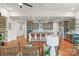 Modern kitchen with gray cabinets, granite countertops, and island seating at 7014 Jolly Brook Dr, Charlotte, NC 28215