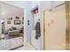 Bathroom featuring tiled floors, vanity, toilet, and stackable washer and dryer at 8931 Meadow Vista Rd, Charlotte, NC 28213