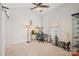 Bright bedroom featuring carpet, a ceiling fan, and ample space for a desk and display case at 8931 Meadow Vista Rd, Charlotte, NC 28213