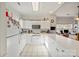 Kitchen boasts modern appliances, white cabinetry, and an open layout for easy entertaining at 8931 Meadow Vista Rd, Charlotte, NC 28213