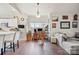 This open and airy living area features both and office space and a living room at 8931 Meadow Vista Rd, Charlotte, NC 28213