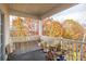 Relaxing porch with a wooden swing, seasonal views, and various plants at 8931 Meadow Vista Rd, Charlotte, NC 28213