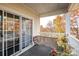 Inviting porch with swing and seasonal views and sliding door access to interior at 8931 Meadow Vista Rd, Charlotte, NC 28213