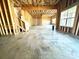 Unfinished basement offering a concrete floor, exposed wood framing, and natural light at 959 Tamary Way # 29/30, Landis, NC 28088