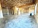 Unfinished basement featuring a concrete floor, exposed wooden framework, and ample space at 959 Tamary Way # 29/30, Landis, NC 28088