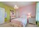 Charming bedroom with full bed, built-in shelving and decorative wall art at 124 Harris Farm Rd, Mooresville, NC 28115