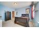 Charming bedroom with built-in shelving and a full-size bed at 124 Harris Farm Rd, Mooresville, NC 28115