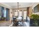 Bright dining room with French doors leading to the backyard at 124 Harris Farm Rd, Mooresville, NC 28115