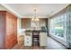 Elegant dining room showcasing a custom island and large windows at 124 Harris Farm Rd, Mooresville, NC 28115