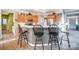 Kitchen with an island, light wood cabinets, and stainless steel appliances at 124 Harris Farm Rd, Mooresville, NC 28115