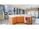 Modern kitchen features stainless steel appliances and light wood cabinets at 124 Harris Farm Rd, Mooresville, NC 28115