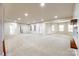 Large basement with multiple windows and doors leading outside for natural light at 373 Fischer Rd, Fort Mill, SC 29715