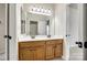 Bathroom featuring a double vanity, large mirror, and neutral finishes at 373 Fischer Rd, Fort Mill, SC 29715