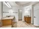 Bathroom features double vanity with granite counters, tile floors, and updated fixtures at 373 Fischer Rd, Fort Mill, SC 29715