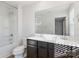 Bathroom boasts a double vanity and a shower/tub combo at 5117 Tinker Field Rd, Charlotte, NC 28215