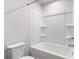 Clean bathroom with a shower/tub combo and built-in shelving at 5117 Tinker Field Rd, Charlotte, NC 28215