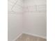 Well-lit closet with wire shelving, providing excellent storage at 5117 Tinker Field Rd, Charlotte, NC 28215