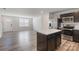 Modern kitchen with stainless steel appliances and an island at 5117 Tinker Field Rd, Charlotte, NC 28215