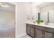 Bathroom featuring double vanity with gray cabinets, white countertop, modern fixtures and tile flooring at 562 Shepherd Ln # 3, Clover, SC 29710