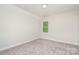 Carpeted bedroom with a window that provides natural light at 562 Shepherd Ln # 3, Clover, SC 29710