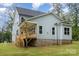 Back exterior angle showing a covered porch with lots of windows at 562 Shepherd Ln # 3, Clover, SC 29710