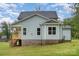 Exterior angle showing the back of the home with a covered porch at 562 Shepherd Ln # 3, Clover, SC 29710