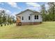 Exterior angle showing the back of the home with a covered porch at 562 Shepherd Ln # 3, Clover, SC 29710