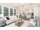 Bright and airy living room featuring coffered ceilings, hardwood floors, and seamless flow at 562 Shepherd Ln # 3, Clover, SC 29710