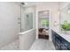 The main bathroom features a walk-in shower with pebble flooring and built-in niche at 562 Shepherd Ln # 3, Clover, SC 29710