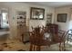 Dining room with built-in shelving and a fireplace at 614 Morven Rd, Wadesboro, NC 28170