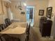 Dining room with wooden table, chairs, and buffet at 614 Morven Rd, Wadesboro, NC 28170