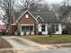 Brick house with a driveway and a nicely landscaped yard at 614 Morven Rd, Wadesboro, NC 28170