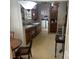 View of kitchen with wooden cabinets and linoleum floor at 614 Morven Rd, Wadesboro, NC 28170