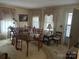 Living Room with vintage furniture and large windows at 614 Morven Rd, Wadesboro, NC 28170