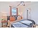 Spacious bedroom with king-size bed and lots of natural light at 816 Wellwood Ave, Statesville, NC 28677