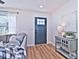 Bright entryway with dark door and console table at 816 Wellwood Ave, Statesville, NC 28677