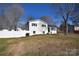 White ranch house with a fenced yard at 816 Wellwood Ave, Statesville, NC 28677