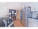 Sleek kitchen featuring stainless steel fridge and dark countertops at 816 Wellwood Ave, Statesville, NC 28677