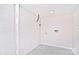 Basement laundry room with white walls and speckled floor at 816 Wellwood Ave, Statesville, NC 28677