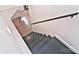 Modern dark-stained staircase leading to lower level at 816 Wellwood Ave, Statesville, NC 28677