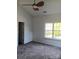 Main bedroom with carpeted floors and ceiling fan at 9618 Langston Mill Rd # 38, Charlotte, NC 28216