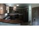 Modern kitchen with granite countertops and stainless steel appliances at 9618 Langston Mill Rd # 38, Charlotte, NC 28216