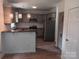 Modern kitchen with granite countertops and stainless steel appliances at 9618 Langston Mill Rd # 38, Charlotte, NC 28216