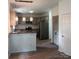 Modern kitchen with granite countertops and stainless steel appliances at 9618 Langston Mill Rd # 38, Charlotte, NC 28216