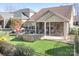 Aerial view of home with large backyard and patio at 136 Chimney Rock Ct, Denver, NC 28037